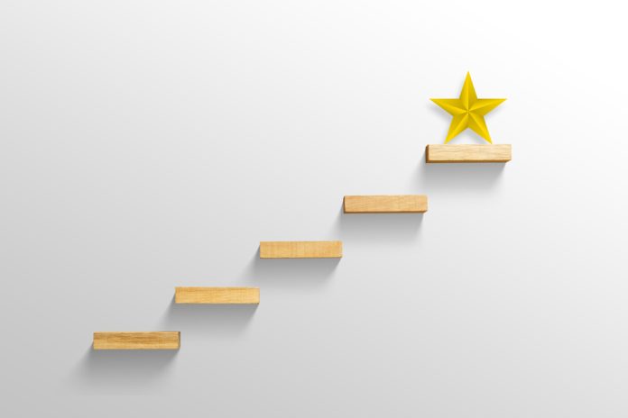 Big,Yellow,Star,On,Stair,,Business,Successful,Concept